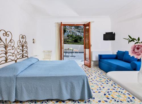 Postel nebo postele na pokoji v ubytování Hotel Vittoria