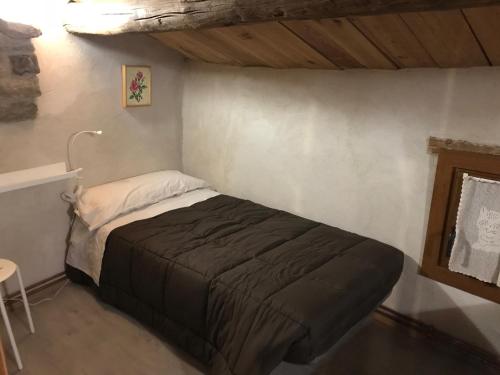 Tempat tidur dalam kamar di La Rectoria