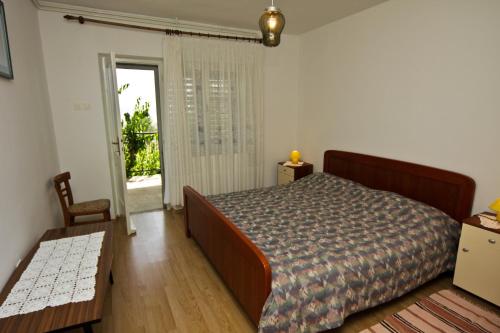 Posteľ alebo postele v izbe v ubytovaní Apartments Ivanko