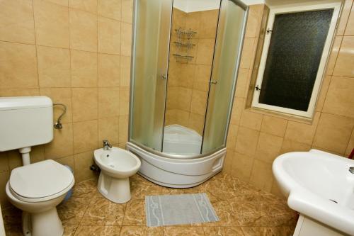 Kúpeľňa v ubytovaní Apartments Ivanko