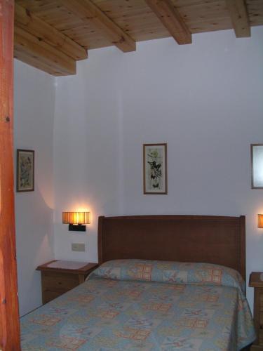 A bed or beds in a room at La casa de la Luz