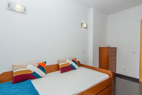 En eller flere senge i et værelse på Apartamentos Turisticos Rocha Tower - MI