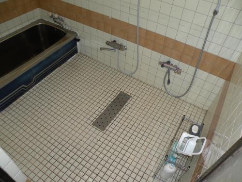 Koupelna v ubytování Business Hotel Minshuku Minato