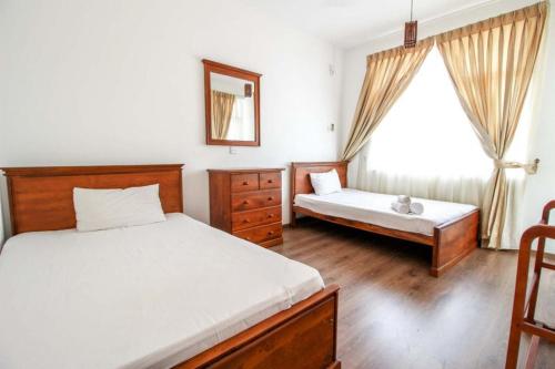 Cama o camas de una habitación en City Square Residencies