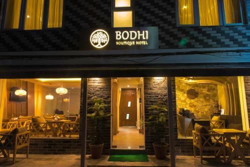 a building with a clock on the front of it at Bodhi Boutique Hotel in Kathmandu
