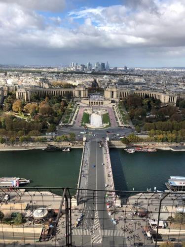 a view of a city with a bridge over a river at Splendid Hôtel in Paris