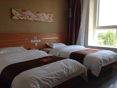 Gallery image of Thank Inn Chain Hotel Sichuan Xichang Qionghai Wetland in Xichang