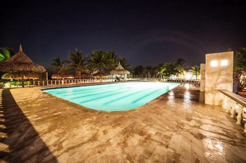 Het zwembad bij of vlak bij Alquiler casa en la playa, Tolu