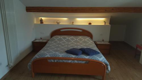 Ein Bett oder Betten in einem Zimmer der Unterkunft Bed and Breakfast Ai Sassi