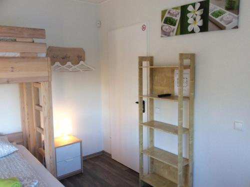 Ένα ή περισσότερα κρεβάτια σε δωμάτιο στο BHB Hotel