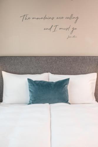 a bed with the words the meddling one daughter and i must go at Arena Franz Ferdinand Nassfeld in Tröpolach