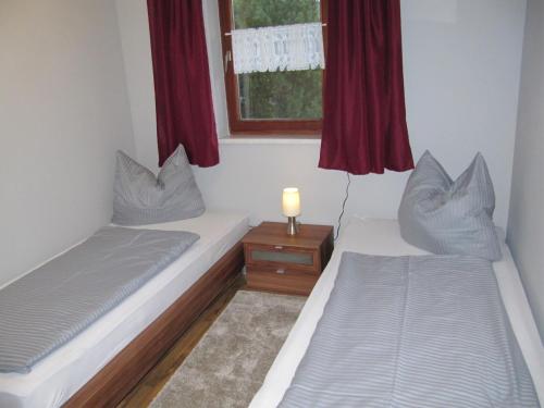 Un pat sau paturi într-o cameră la Eschenkamp 9a