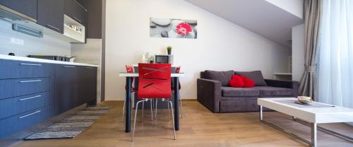 a living room with a table and a couch at Villa Nena in Makarska