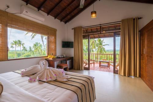 Gulta vai gultas numurā naktsmītnē Ananya Beach Resort