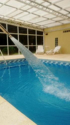 La alberca dentro o cerca de Las Lomas Suites & Spa