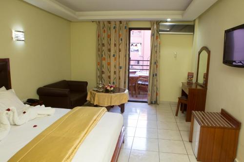 TV a/nebo společenská místnost v ubytování Hotel Gomassine