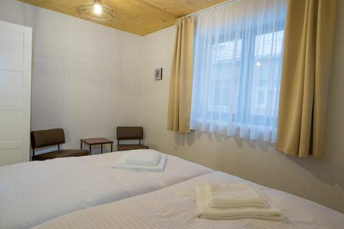 Postel nebo postele na pokoji v ubytování Wellness privát Štyri Lipy