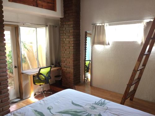 Postel nebo postele na pokoji v ubytování B&B Oui Madame