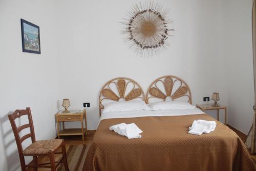 Postel nebo postele na pokoji v ubytování B&B Otranto 100 mt mare