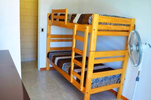 a pair of bunk beds in a room at Malaquias in Villa Carlos Paz