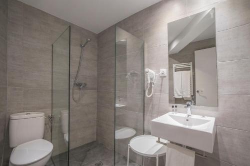 Koupelna v ubytování Hotel Roca