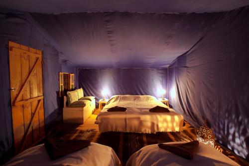 Bivouac La Dune Blancheにあるベッド