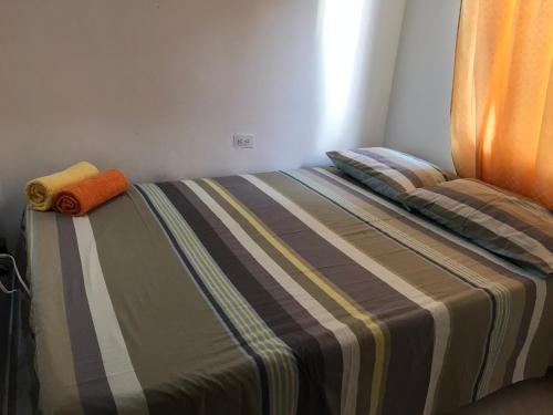 Cama o camas de una habitación en Posada Martha´s Place