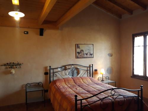 Postel nebo postele na pokoji v ubytování Agriturismo Trebis