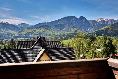 a view of the mountains from a house at New Willa Jan in Zakopane