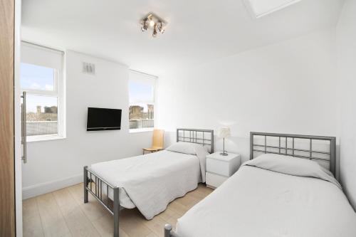 Katil atau katil-katil dalam bilik di 202 Apartments