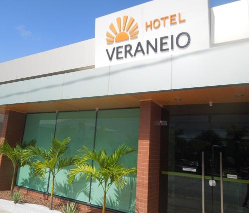 a building with a sign on the front of it at Hotel Veraneio in Recife