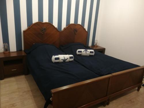 Ένα ή περισσότερα κρεβάτια σε δωμάτιο στο Apartamenty w Gorach Stolowych