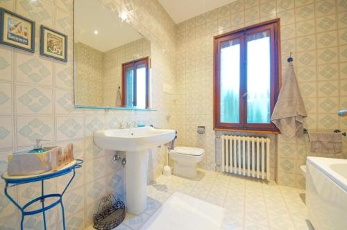 Ett badrum på Treviso Casa Magnolie wi-fi
