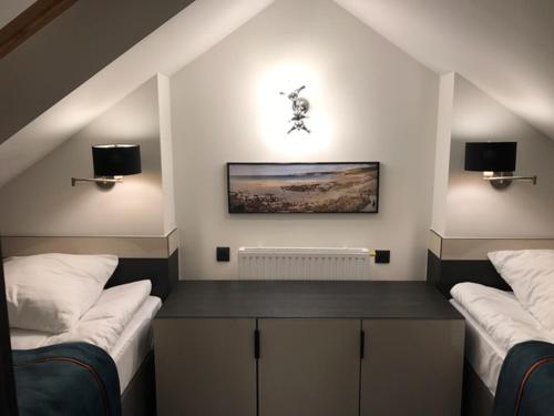 Säng eller sängar i ett rum på Armada Holiday House