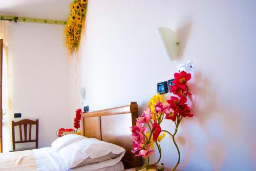 Katil atau katil-katil dalam bilik di Agriturismo Mare e Monti