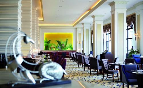 Χώρος καθιστικού στο Country Garden Phoenix Hotels Shenyang Yuhong