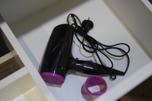 a hair dryer sitting on top of a table at Berloga Pylypets in Pilipets