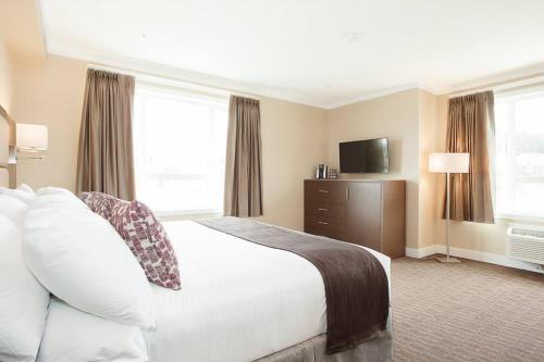 Кровать или кровати в номере MStar Hotel