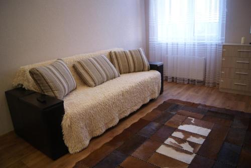 Ένα ή περισσότερα κρεβάτια σε δωμάτιο στο Usad'ba Razumovskogo