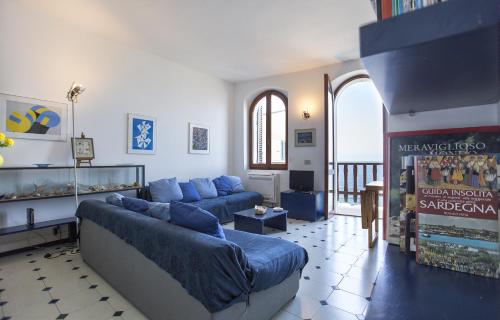 Area soggiorno di Alguerhome Casa Blu sea view
