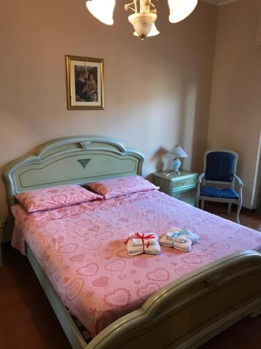 A bed or beds in a room at Villaggio Lamezia Golfo