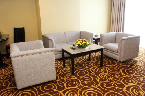Un lugar para sentarse en Mega Hotel Sdn Bhd