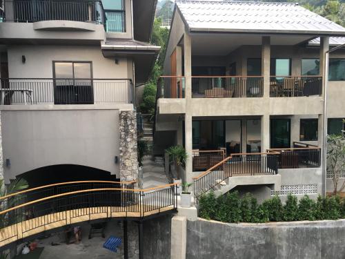an aerial view of a house with a balcony at Baan Andaman Sea Surf in Patong Beach