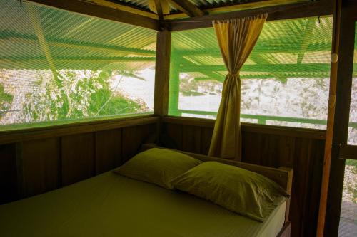 A bed or beds in a room at Albergue La Laguna