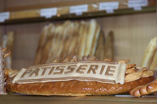 a loaf of bread with a sign on top of it at Le Grand Hôtel Diego in Diego Suarez
