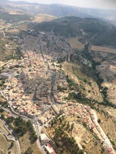 an aerial view of a city with houses and roads at Experience Il Paesino in Licodia Eubea