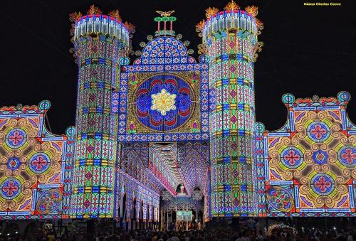 a large building with lights on it at night at Mediterraneo B&B in Maglie