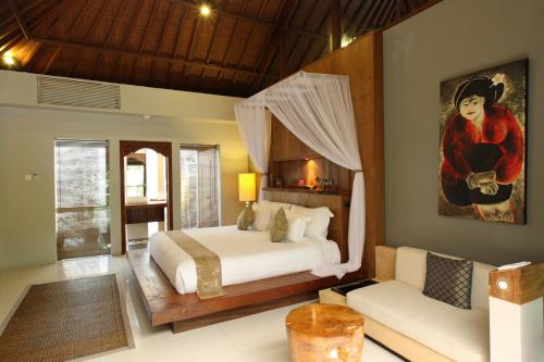 Ένα ή περισσότερα κρεβάτια σε δωμάτιο στο Swarapadi Villa