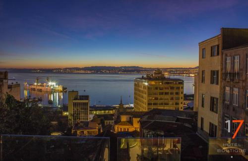 a view of a city with a river and buildings at Hotel Boutique 17 in Valparaíso