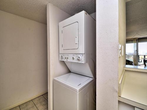 a utility room with a washer and dryer in a house at 440 West Condo 1604N in Clearwater Beach